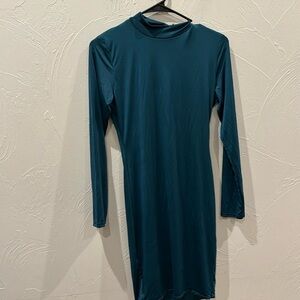 Emerald green slinky, high neck bodycon dress